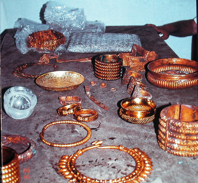 Gold bracelets, vessels and other treasures discovered in Tomb II at Nimrud.