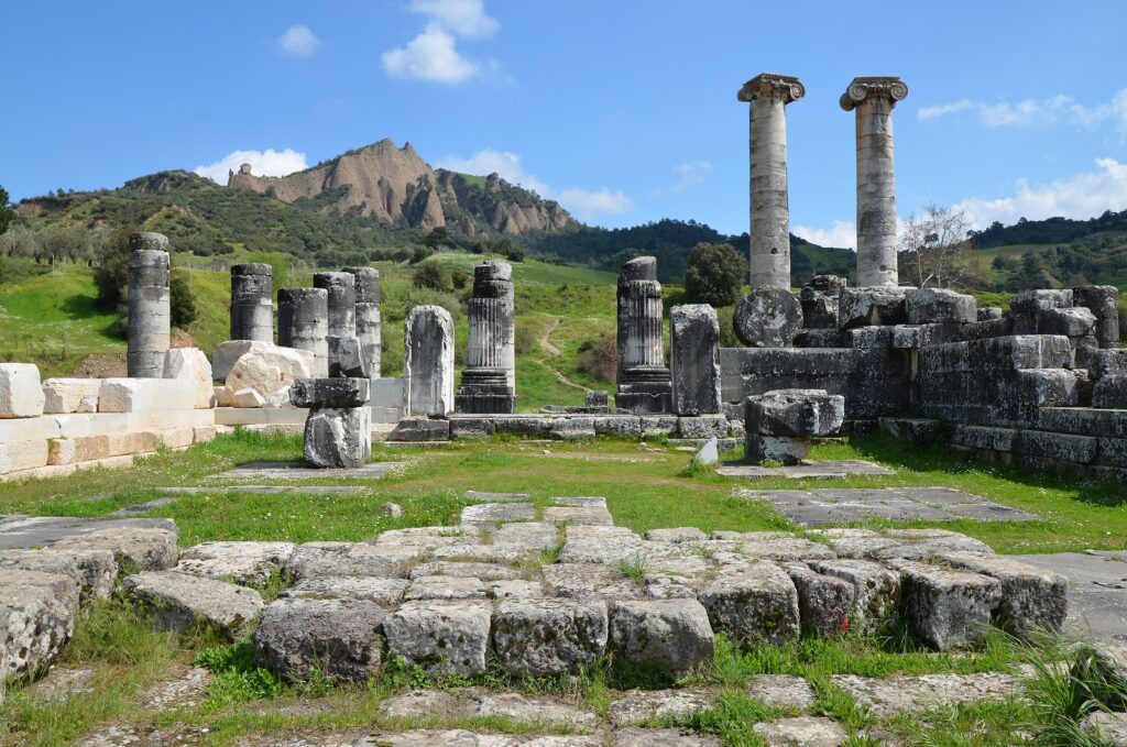 Monumental surviving columns and ruins of the ancient Temple of Artemis at Sardis, western Türkiye.