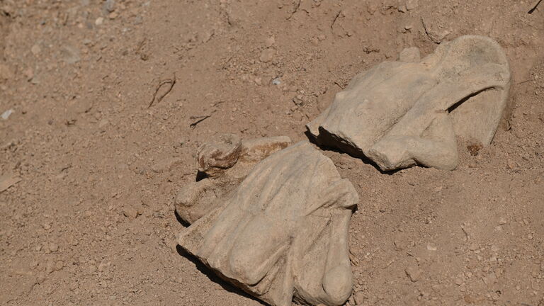Broken fragments of a Roman Victoria statuette found at Kapersburg.
