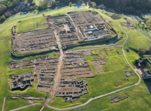 An Enamelled Roman Sword Fitting Emerges From a 1,800-Year-Old Layer at Vindolanda