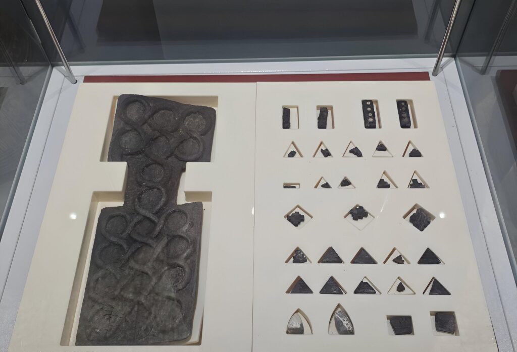 A board game discovered in Grave 731 at Shahr-i Sokhta in 1977. Dating to around 2600–2400 BC, the set is a separate find from the new type of 4,600-year-old game announced during the 2026 excavation season. Credit: Public Domain