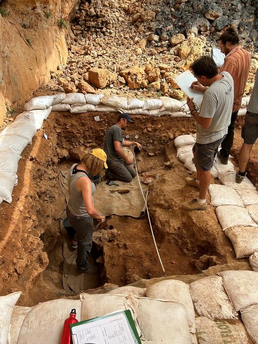 Archaeologists working at Latnija Cave in Malta, where evidence of prehistoric hunter-gatherers was uncovered.