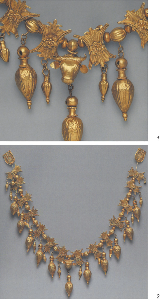 Gold necklace from the Karagodeuashkh burial mound with lotus-shaped dividers, suspended ornaments, and a central bull-head element.