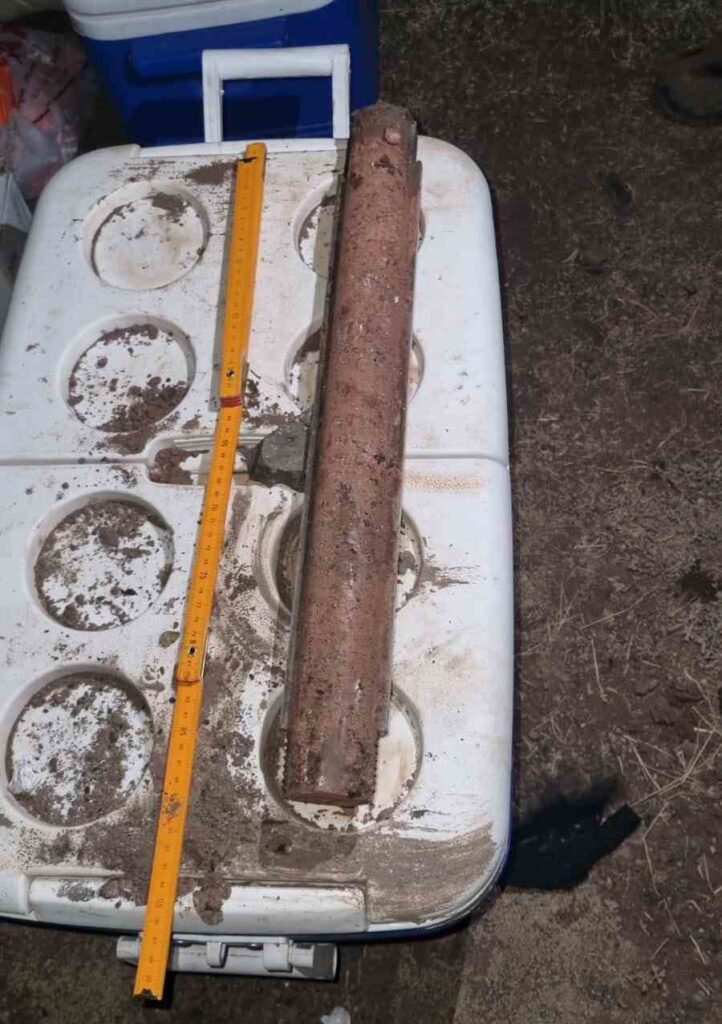 Cylindrical sample from the Durupınar investigation displayed beside a measuring ruler.