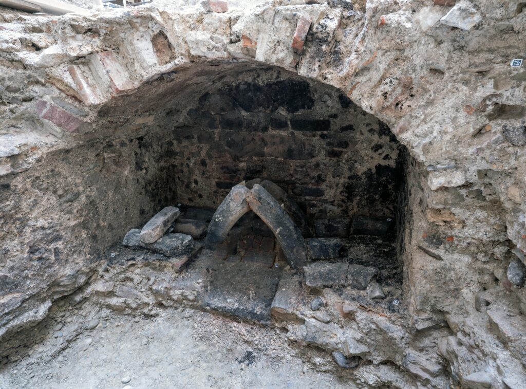 After archaeologists removed the stone filling, the furnace channel came to light.