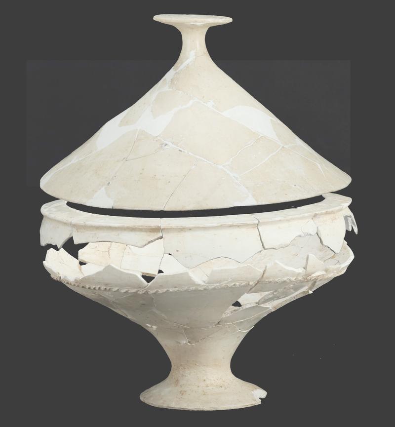 Large white pottery vessel unearthed at the prehistoric Nanzuo archaeological site in China.