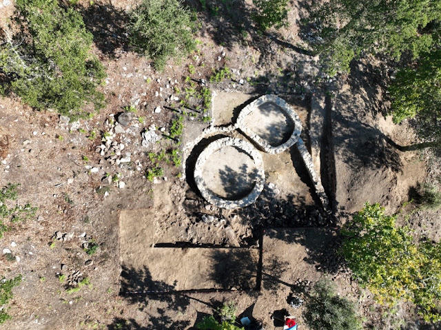 Archaeological excavation area at Castro do Pico da Bandeira in Galicia, Spain, where a carved granite stone was discovered.