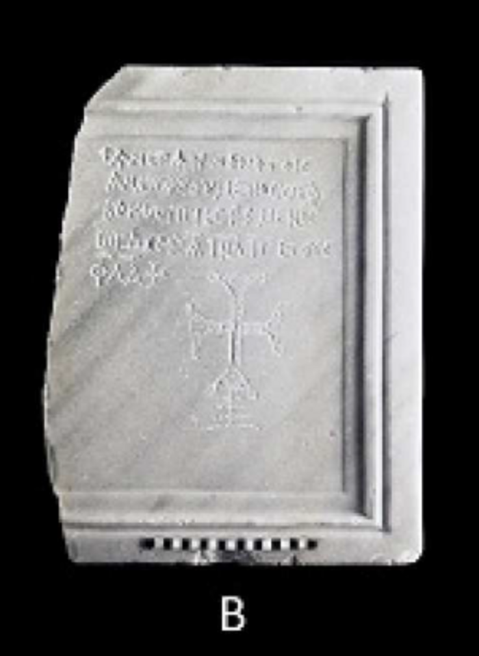 Byzantine marble tombstone of priest Stephanos from Shivta, featuring a Greek inscription and an engraved Golgotha Cross.