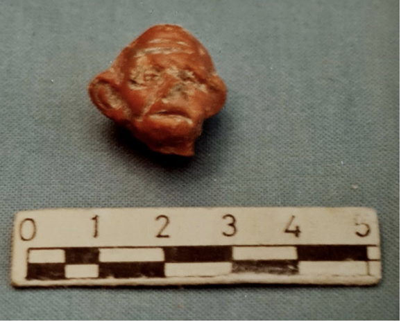 Fragment of a terracotta Silenos head discovered in the necropolis of ancient Attouda, Türkiye, and preserved in the Denizli Museum.