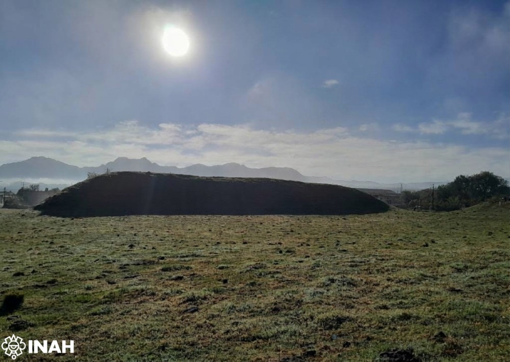 Ancient stepped stone structure at Teteles de Ávila Castillo photographed with the Sun above it.