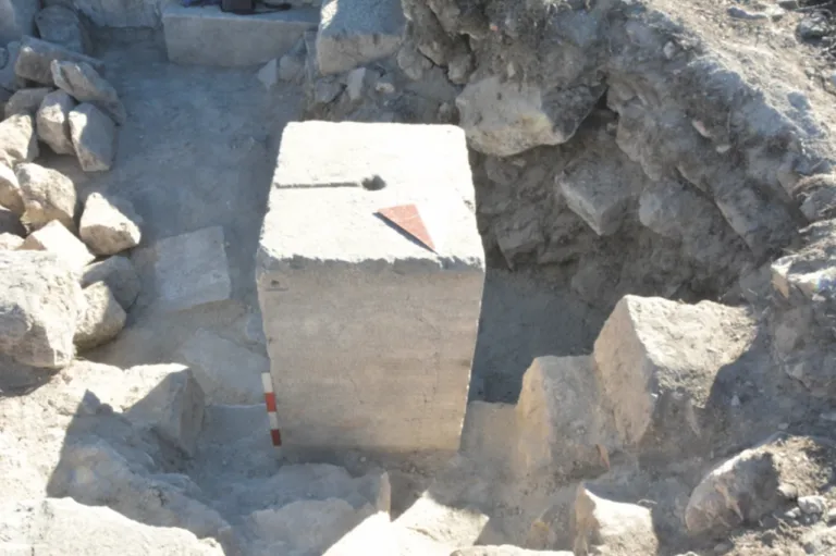 Ancient limestone oracle monument uncovered during excavations at Kibyra, showing the original findspot on the third terrace of the Agora.