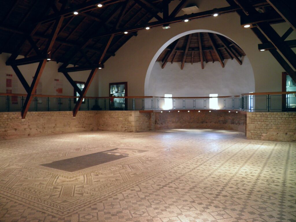 Large Roman mosaic preserved inside the basilica at the archaeological site of Grand in France.