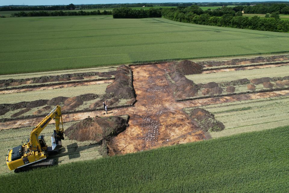 Archaeological excavation revealing a 2,500-year-old alignment of postholes near Schæfergårde in West Jutland, Denmark.