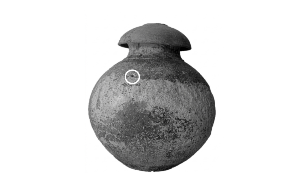 Urartian burial urn from Van-Altıntepe in eastern Türkiye, featuring a deliberately pierced hole near its shoulder.