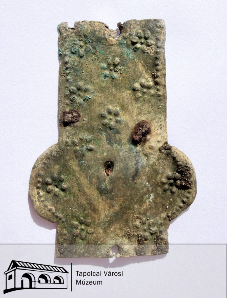 Reverse-side copper fragment from the medieval cross discovered in the sacristy of Avas Church.