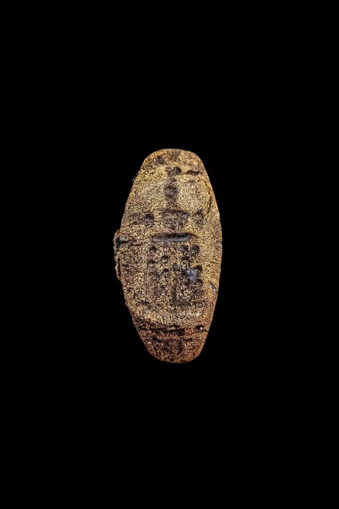 Bronze seal ring bearing an engraved image of the Lighthouse of Alexandria, found underwater at Antirhodos in Alexandria’s Eastern Harbour.