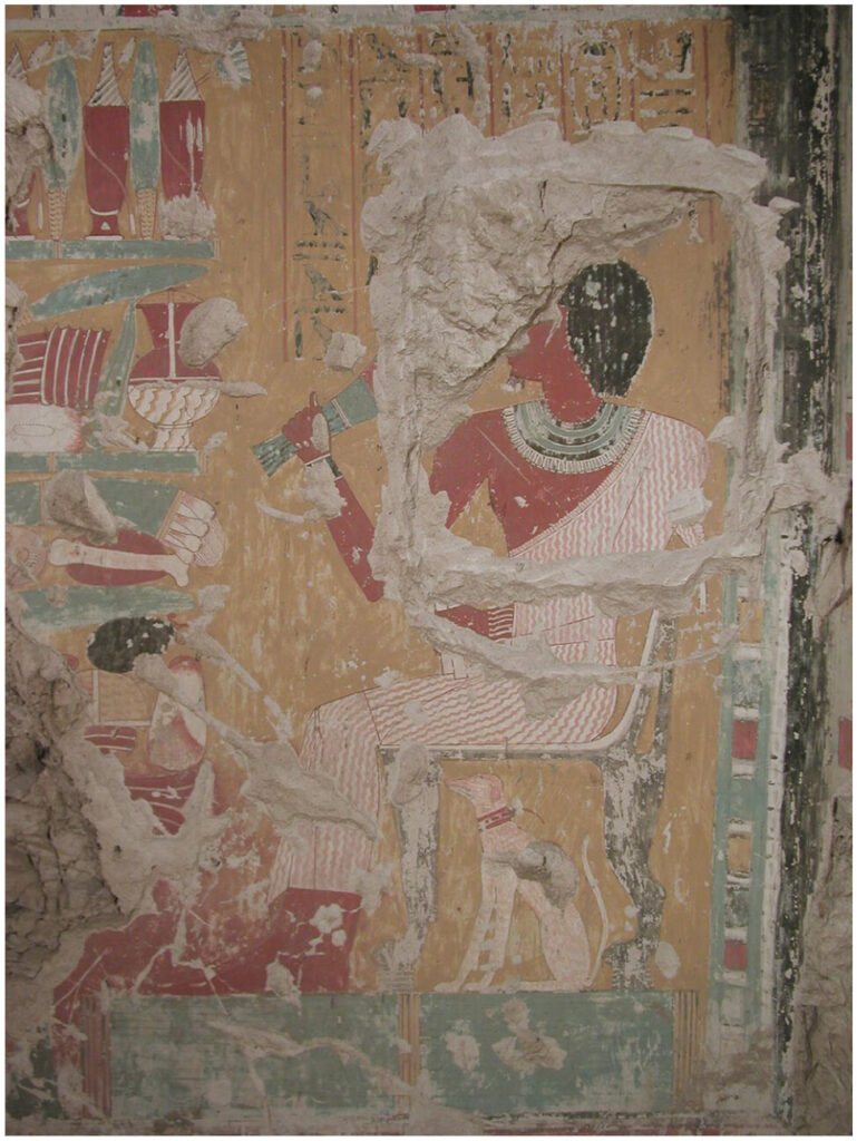 Offering scene from the 18th Dynasty tomb of User (TT 21) at Thebes, with User seated on a chair and a dog positioned beneath him.